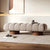 Modern Arco Ottoman with rounded segments and wood legs