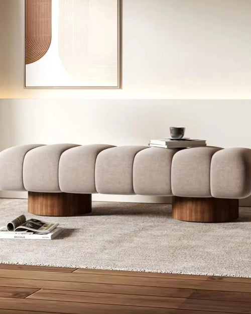 Modern Arco Ottoman with rounded segments and wood legs