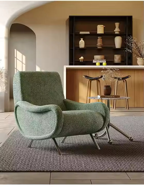 Green armchair in a modern living room 