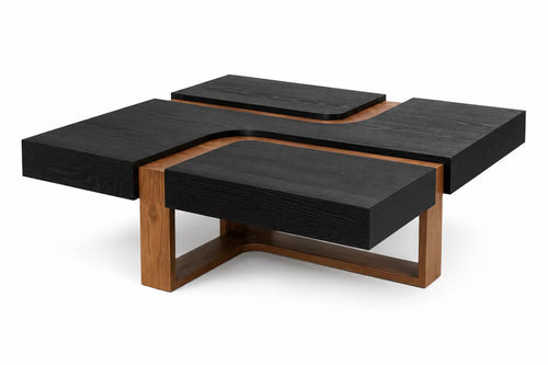 Josma Center Table featuring a bold layered geometric design with deep black tabletops, a raised central tray, and contrasting warm wooden frame accents.