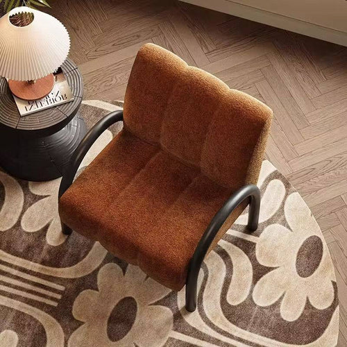 Brown vintage lounge chair with black arches