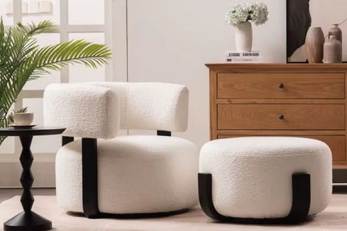 Experience the Naman Bouclé Chair by Chair Collective — a sculptural accent chair in plush bouclé fabric with teak support and optional footstool. Shop this luxury accent chair online in India for modern comfort and contemporary elegance. 