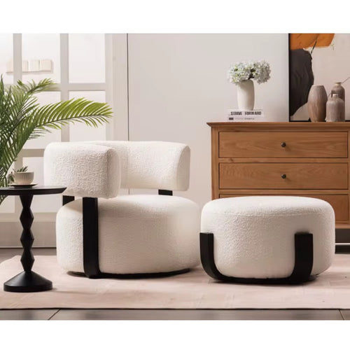 Experience the Naman Bouclé Chair by Chair Collective — a sculptural accent chair in plush bouclé fabric with teak support and optional footstool. Shop this luxury accent chair online in India for modern comfort and contemporary elegance. 