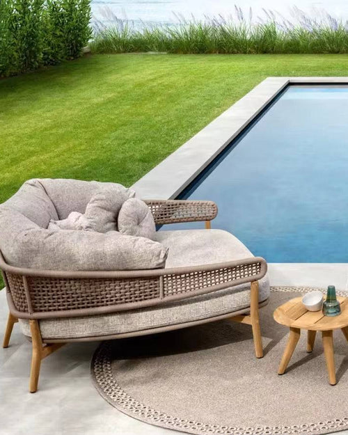 Outdoor patio set with a cushioned chair