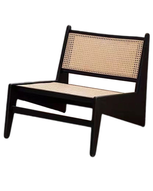 Black frame chair with woven back and seat