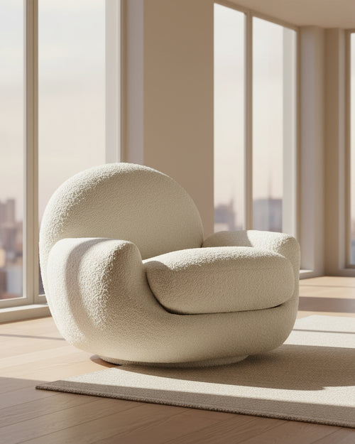 Discover the Noa Luxury Accent Chair, a modern sculptural chair in soft bouclé. A perfect blend of comfort and design for sophisticated living spaces.