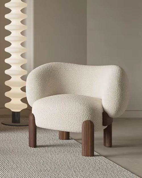 Nordic Luxury Chair by Chair Collective. Discover this luxury accent chair with boucle fabric with japandi style structure.  