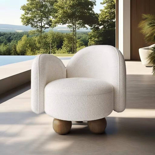 Modern white armchair with wooden legs
