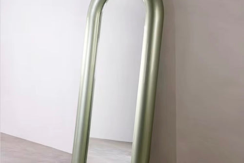 Peroni Mirror is a luxury full-length arched mirror with a sculptural frame, available in multiple colour finishes—perfect for modern bedrooms, entryways, and statement corners.
