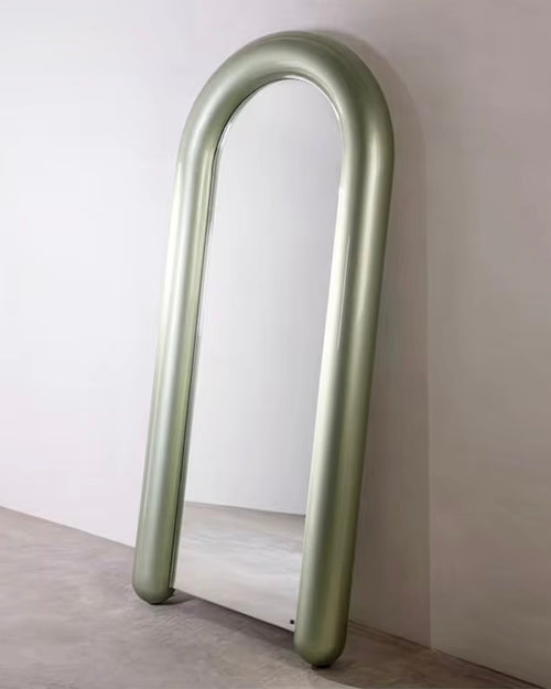 Peroni Mirror is a luxury full-length arched mirror with a sculptural frame, available in multiple colour finishes—perfect for modern bedrooms, entryways, and statement corners.