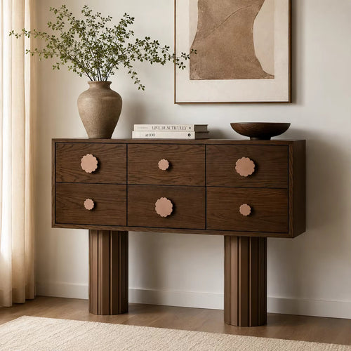 Hutch Storage Console featuring six wooden drawers with playful flower-shaped knobs and sculptural fluted legs, designed as a functional statement piece for contemporary interiors.