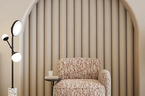 Discover the Reiha Chair by Chair Collective — a plush modern chair with abstract fabric and built-in wooden side table. Shop luxury accent chairs online in India.