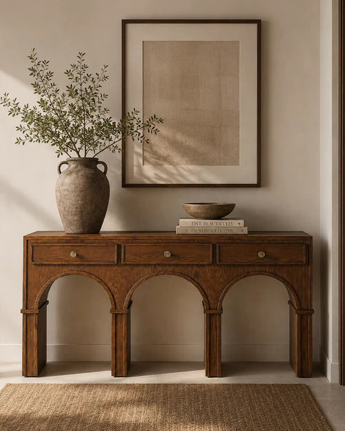 Roma Foyer Console featuring a rich wood veneer finish, three integrated storage drawers, and a distinctive architectural three-arched base.