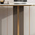 Detail of the sculptural gold fluted pillar