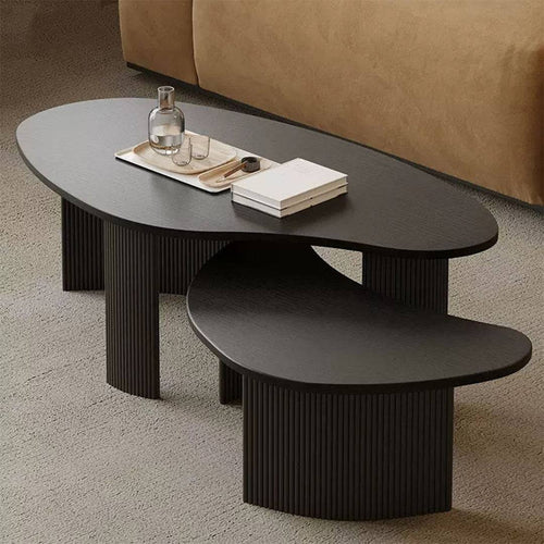Shelby black coffee tables with oval tops side profile