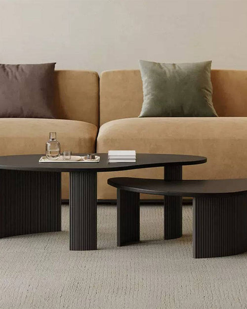 Two Shelby contemporary black oval coffee tables with fluted base