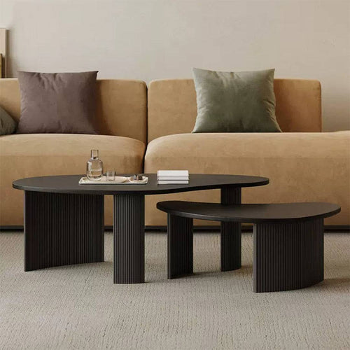 Two Shelby contemporary black oval coffee tables with fluted base