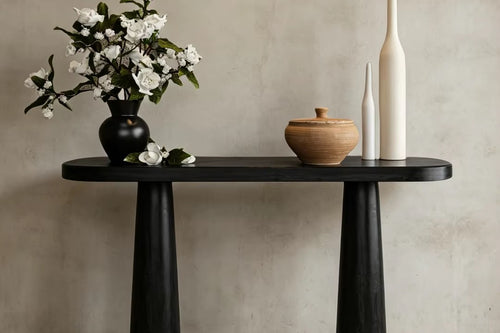 Modern 40-inch foyer console featuring a refined veneer top and sculptural black-finished legs, designed for compact entryways and contemporary interiors.