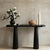 Modern 40-inch foyer console featuring a refined veneer top and sculptural black-finished legs, designed for compact entryways and contemporary interiors.