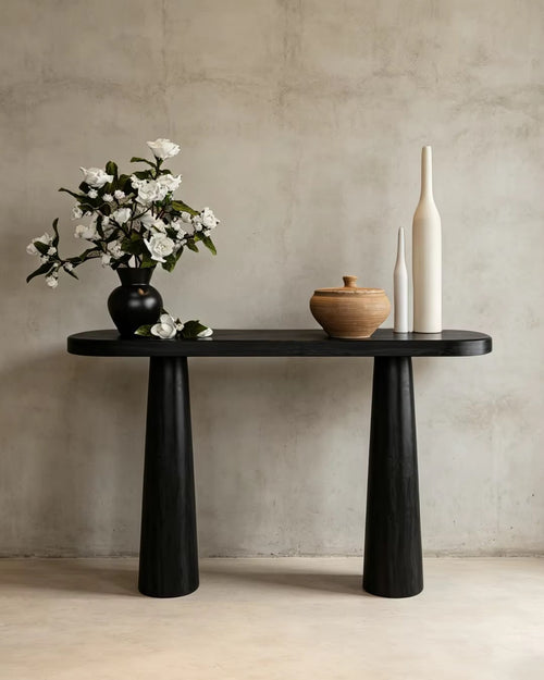Modern 40-inch foyer console featuring a refined veneer top and sculptural black-finished legs, designed for compact entryways and contemporary interiors.