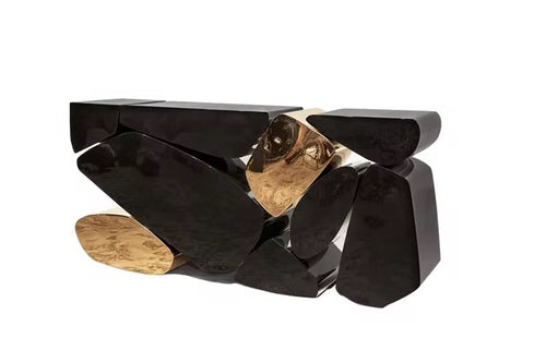 The Takai Luxury Console is one of the most visually striking modern consoles available in India, designed for homes that appreciate high-end craftsmanship and sculptural furniture design. With its high-gloss black finish, polished gold panels, and Stonehenge-inspired silhouette, this console is ideal for anyone searching for:

luxury entryway console,

modern black and gold console table,

designer console table India,

premium sculptural furniture,

ultra-luxury home décor pieces,

high-end modern console