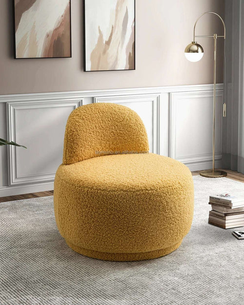 Modern yellow Terry Chair with a low backrest.