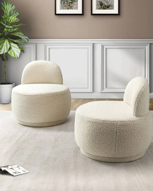 Terry Low-Back Armchair, showcasing its premium fabric 