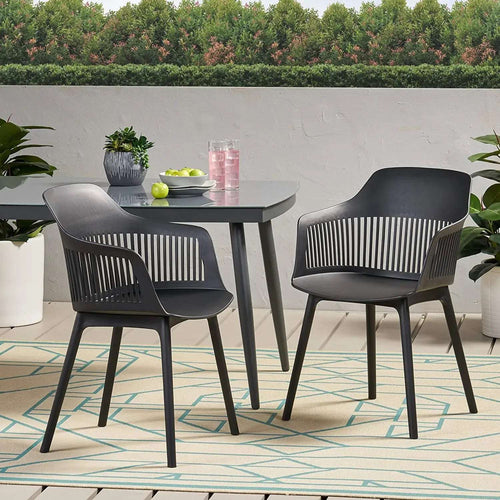 Pair of black Toit chairs with a matching table 