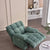 Elegant lounge with minimalist Suzuka recliner chair in Granny Smith tones