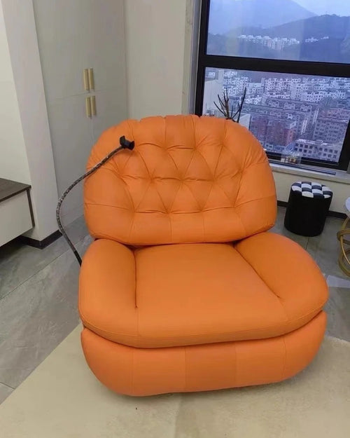 Built-in phone holder in recliner for hands-free media viewing