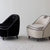 Black and cream piped lounge chairs pair