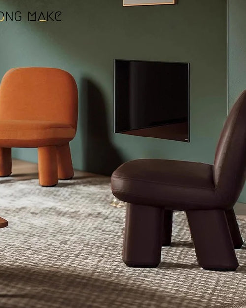 Tumble Chair in various bright velvet colors