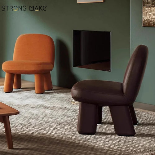 Tumble Chair in various bright velvet colors