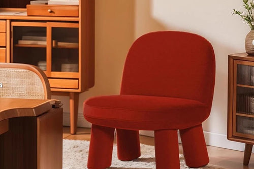 Tumble unique design chair in red velvet