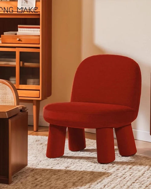Tumble unique design chair in red velvet