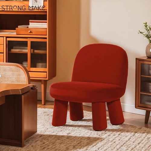 Tumble unique design chair in red velvet