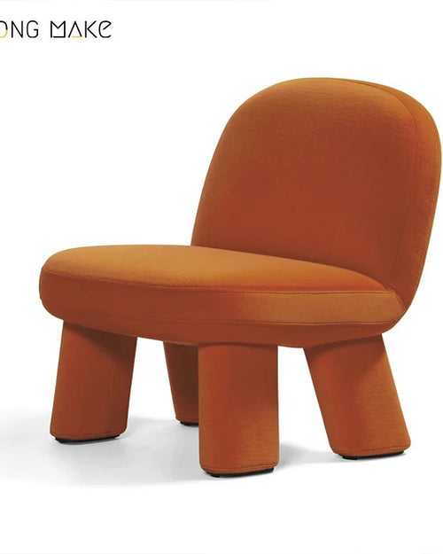 Tumble Chair in orange velvet