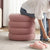 Unio Pouf in pink with ring design 