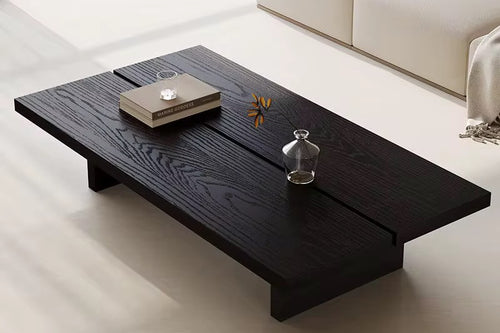 Discover the Vormir Coffee Table — a sleek, minimal luxury coffee table in rich veneer, perfect for modern and Japandi-inspired interiors. Shop this luxury coffee table online in India by Chair Collective