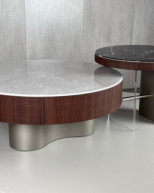 Bring home the Wade Luxury Coffee Table, a masterpiece that blends contemporary design with timeless materials. The combination of marble, embossed veneer, PU-coated base, and glass sets this centrepiece apart as a premium furniture highlight for any luxury living room. Designed for modern Indian homes seeking high-end furniture online, Wade elevates the space with its artistic structure, storage convenience, and premium craftsmanship.
