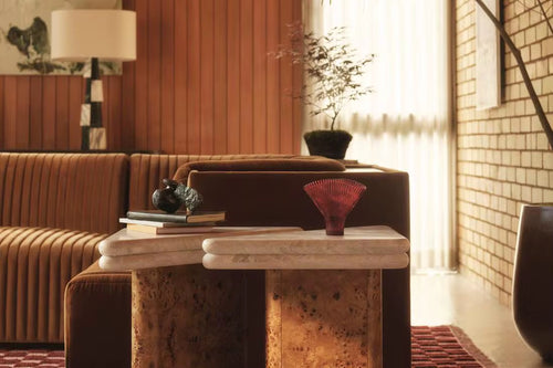 Discover the Waffle End Table Set by Chair Collective — crafted in natural Mapa veneer with a high-gloss finish and topped with elegant travertine marble. A stunning statement of modern luxury for your home.