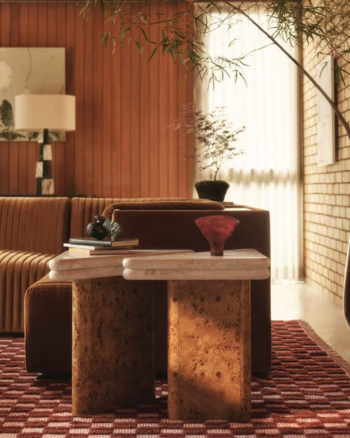 Discover the Waffle End Table Set by Chair Collective — crafted in natural Mapa veneer with a high-gloss finish and topped with elegant travertine marble. A stunning statement of modern luxury for your home.