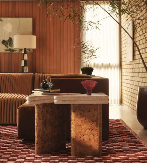 Discover the Waffle End Table Set by Chair Collective — crafted in natural Mapa veneer with a high-gloss finish and topped with elegant travertine marble. A stunning statement of modern luxury for your home.