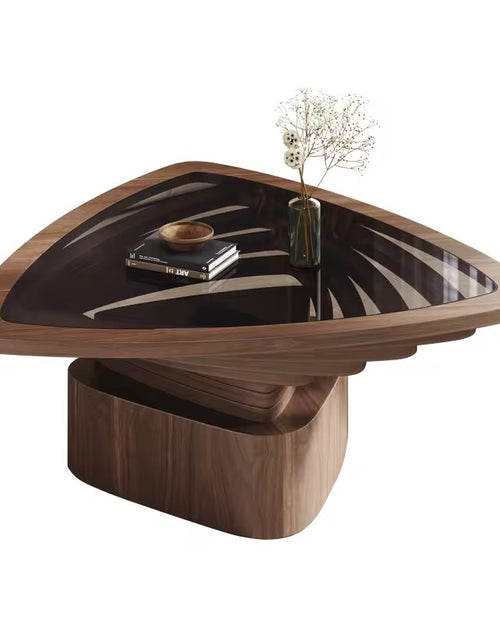 Wooden coffee table with a glass top 