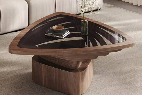 Modern wooden coffee table with a glass top in a living room