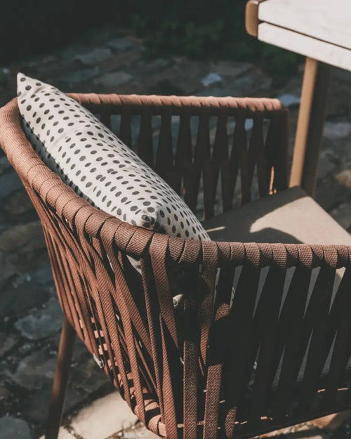 Back profile of Yuno Wicker chair