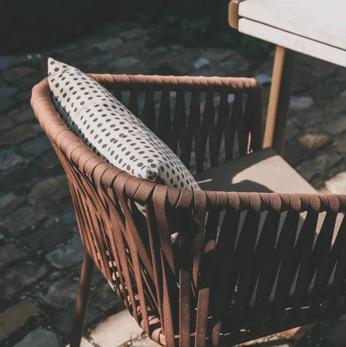 Back profile of Yuno Wicker chair