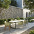 Yuno Wicker green chair set in outdoor area.