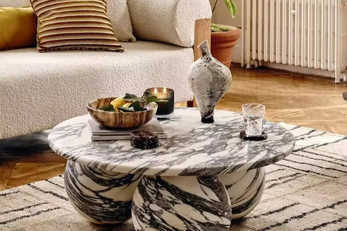 Discover the Zeenia Marble Coffee Table—an ultra-luxury sculptural centre table carved from premium marble. A true statement piece for modern, wabi-sabi and contemporary interiors. Marble options available. Luxury Coffee Table in Marble online 