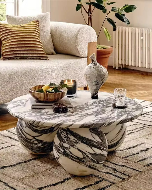 Discover the Zeenia Marble Coffee Table—an ultra-luxury sculptural centre table carved from premium marble. A true statement piece for modern, wabi-sabi and contemporary interiors. Marble options available. Luxury Coffee Table in Marble online 